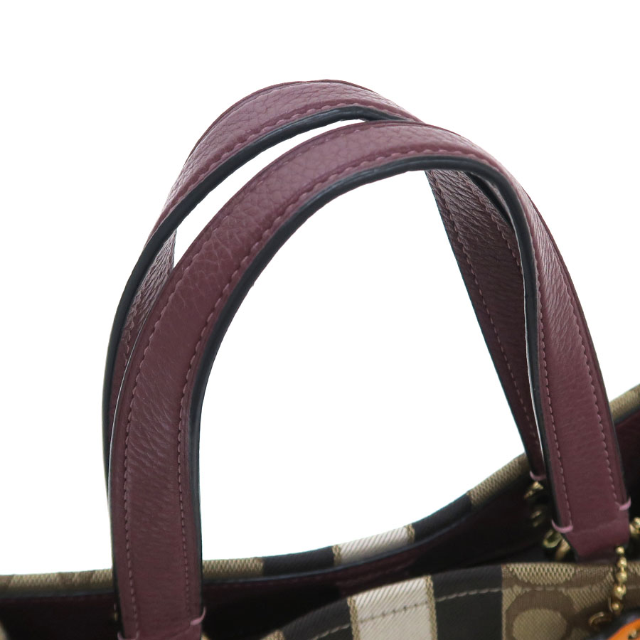 COACH 【新品未使用】清楚な白 シンプル 存在感 デンプシー キャリ  