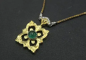 18金石付ペンダントを金買取致しました